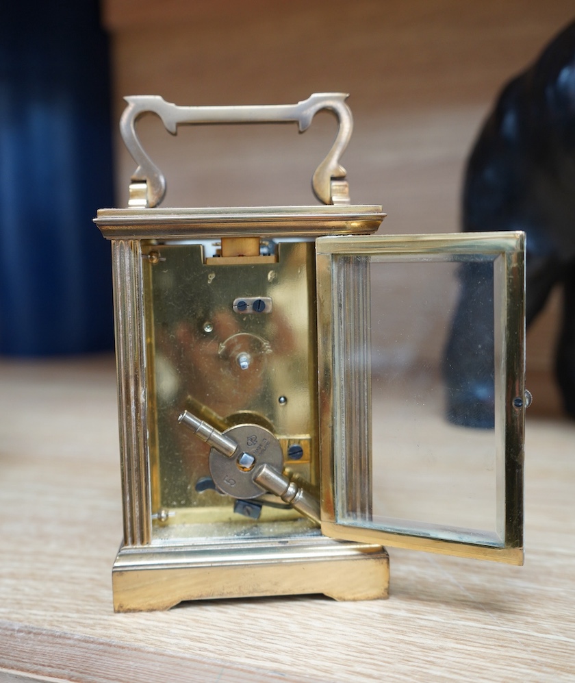 A French eight day carriage timepiece, 11.5cm high. Condition - fair to good.